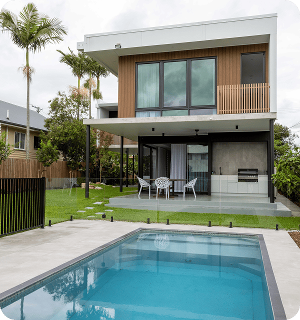 Modern contemporary two-storey house with outdoor swimming pool, patio, and garden in a residential area, featuring large glass windows, sleek design, and outdoor entertainment space.